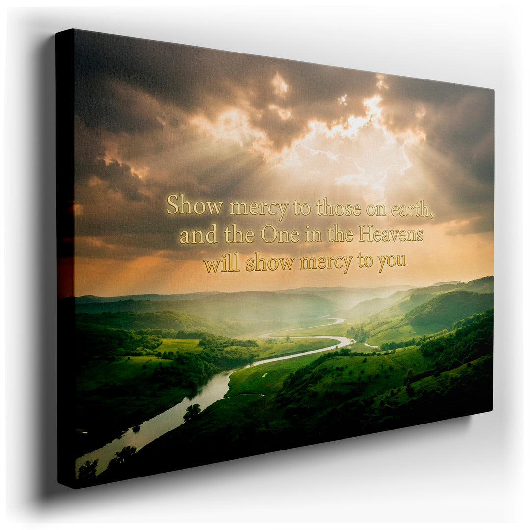 Landscape wall art showing rolling hills and river under a sky with sun rays, featuring an inspirational mercy quote.