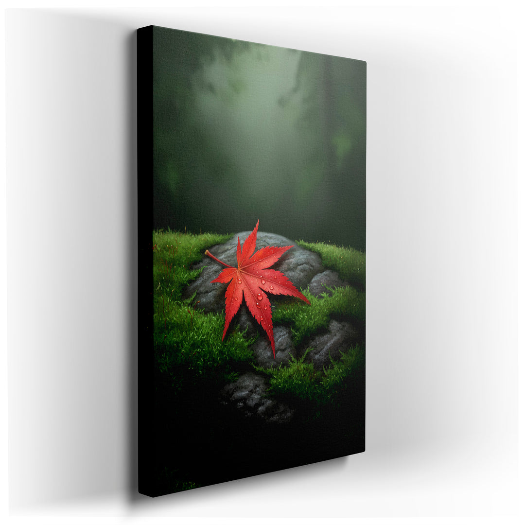 A vibrant red maple leaf with water droplets rests on a mossy stone; a nature-inspired wall art piece.