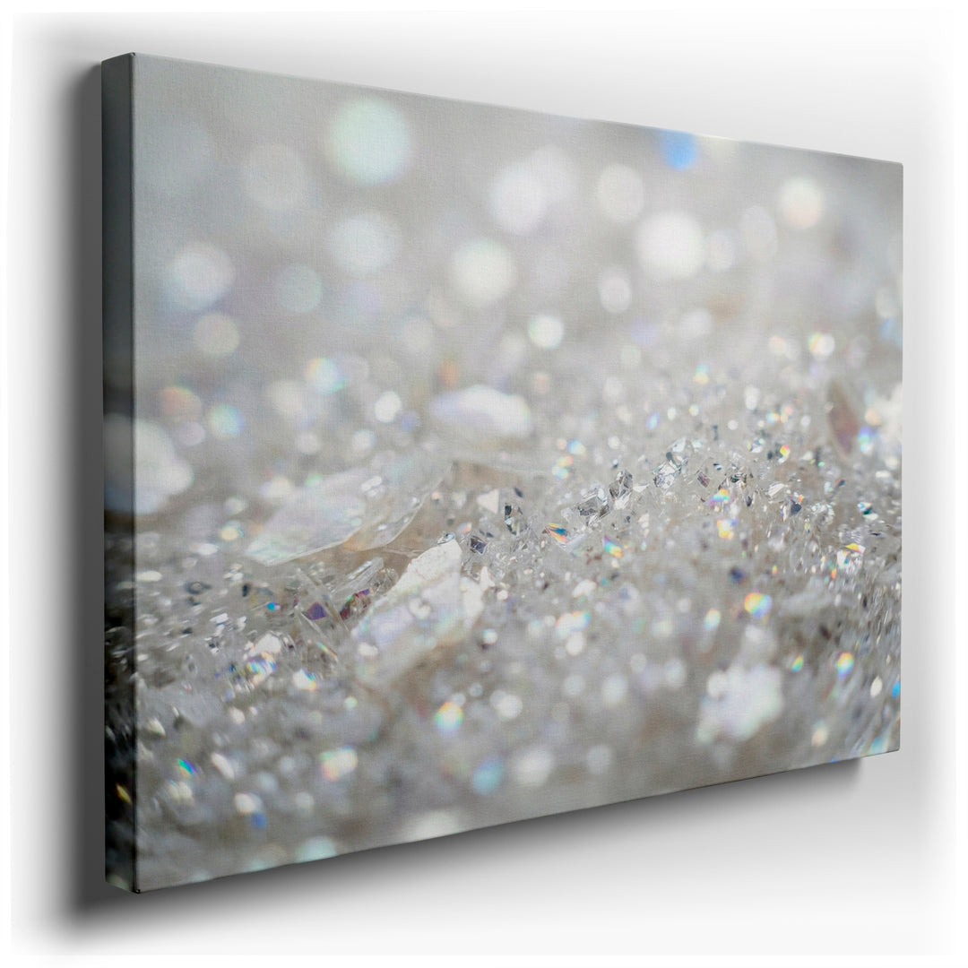 Abstract wall art featuring shimmering crystal fragments and light creating a textured and sparkling visual effect.