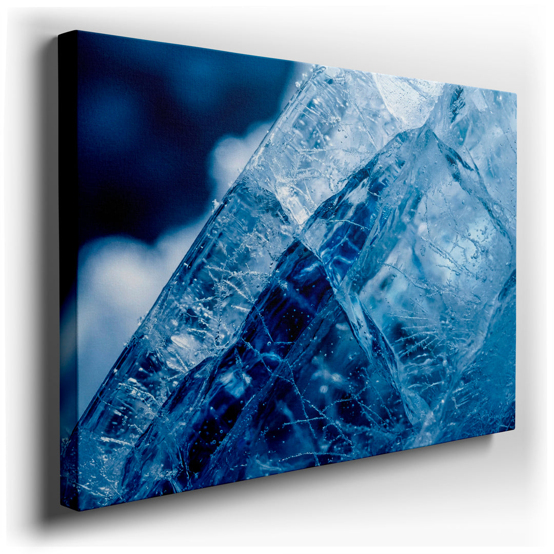 Close-up of a blue ice formation, showcasing intricate crystal patterns in a cool and captivating abstract wall art.