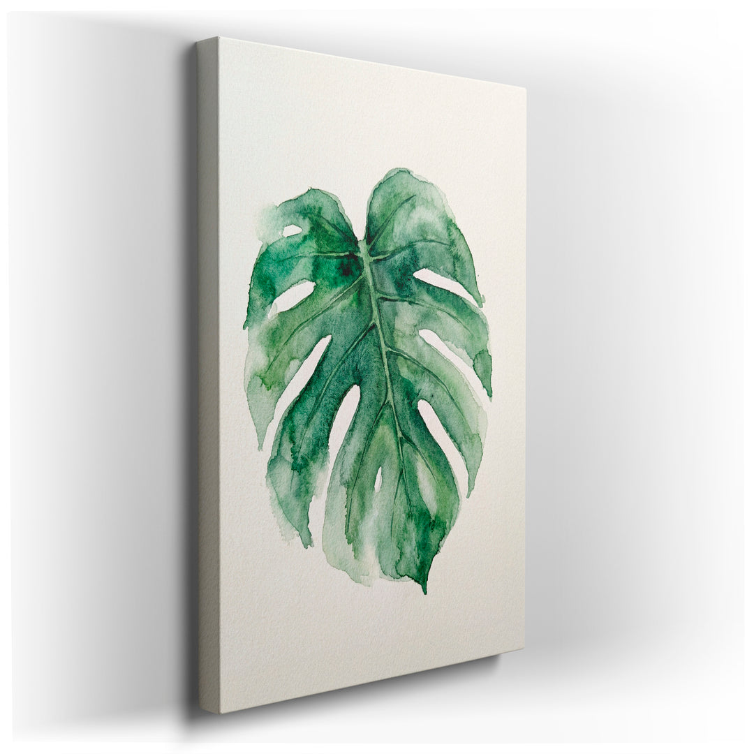 Watercolor painting of a single, vibrant green Monstera leaf showcasing its distinct fenestrations, set against a plain background.