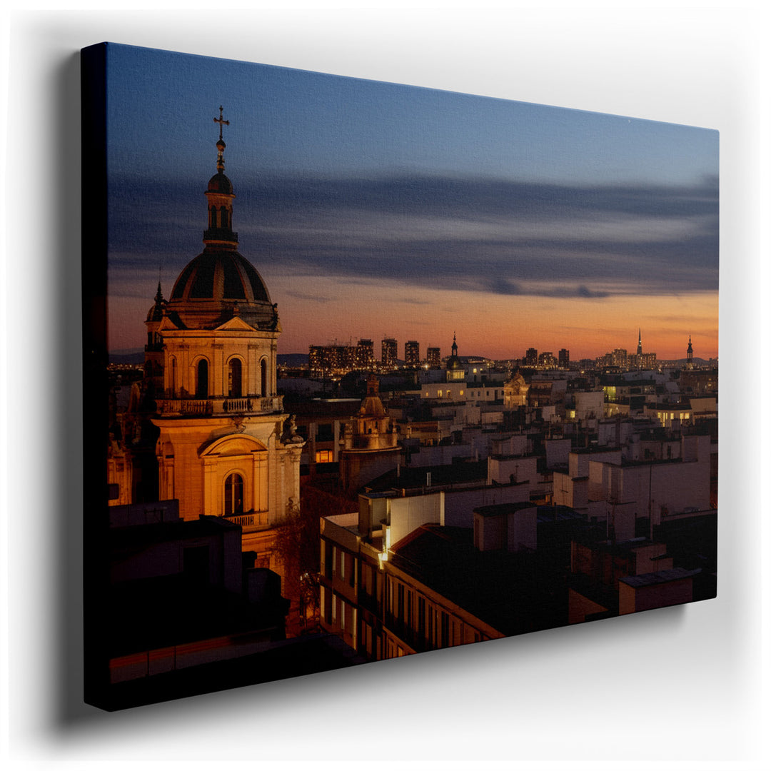 canvas print on wrapped canvas for wall decor – The wall art in question is a masterful depiction of a city skyline at sunset, where the light of the fading sun casts a...