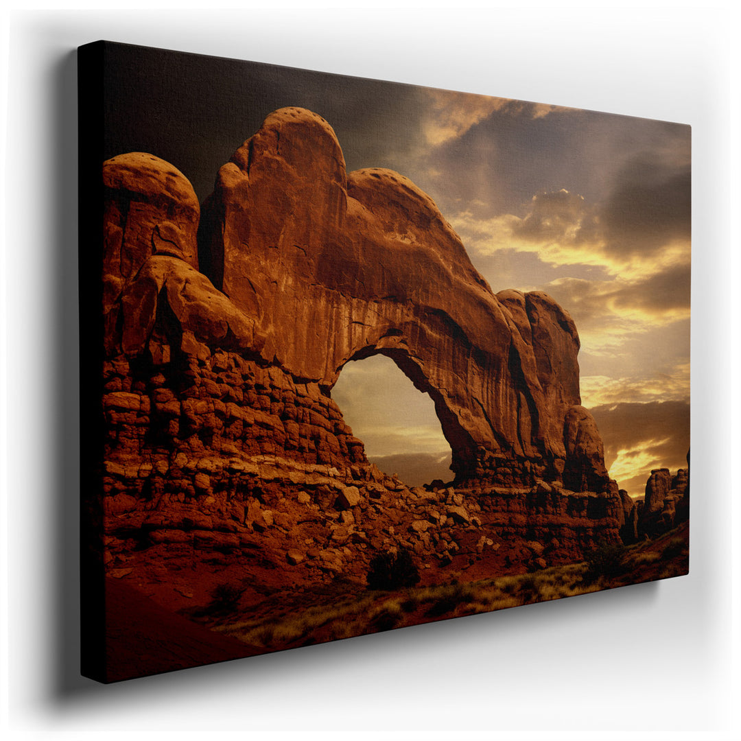 canvas print on wrapped canvas for wall decor – This wall art, a breathtaking portrayal of a majestic rock archway set in a serene desert landscape, is a masterpiece of...