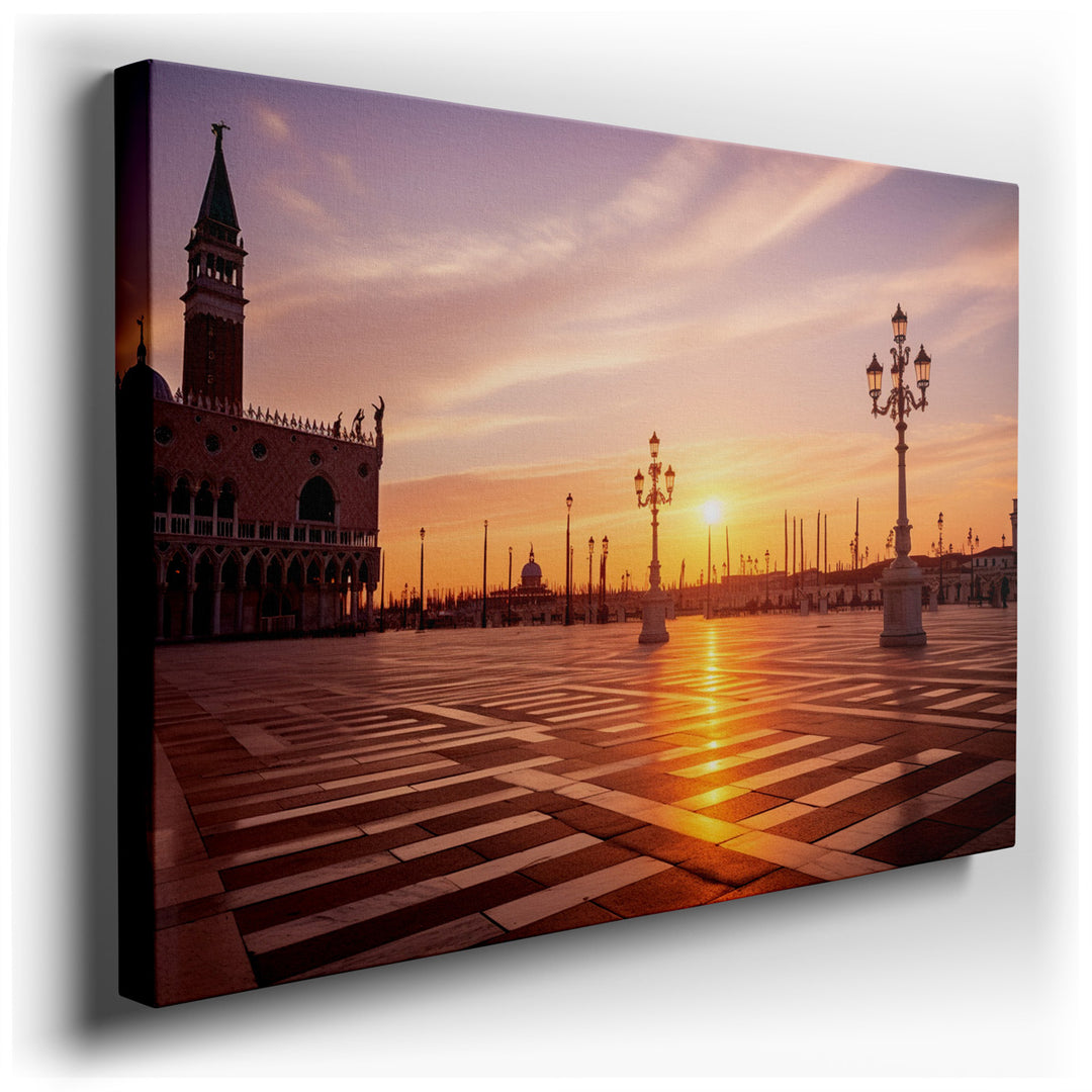 canvas print on wrapped canvas for wall decor – This wall art, a masterful depiction of a European piazza bathed in the golden light of the setting sun, captures the es...