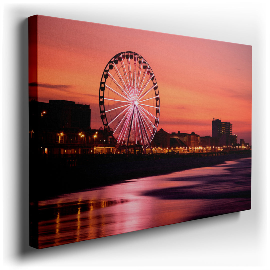 canvas print on wrapped canvas for wall decor – This enchanting wall art captures the essence of a serene evening at a beachside amusement park, centered around the maj...