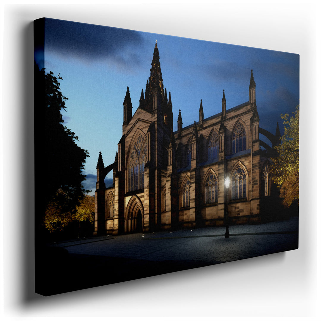 canvas print on wrapped canvas for wall decor – This wall art captures the majestic essence of a grand cathedral, portrayed under the enchanting cloak of nightfall. The...