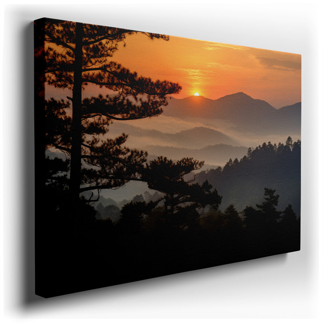 canvas print on wrapped canvas for wall decor – This wall art captures a breathtaking scene of a sunset enveloping a mountainous landscape in a warm, radiant glow. The...