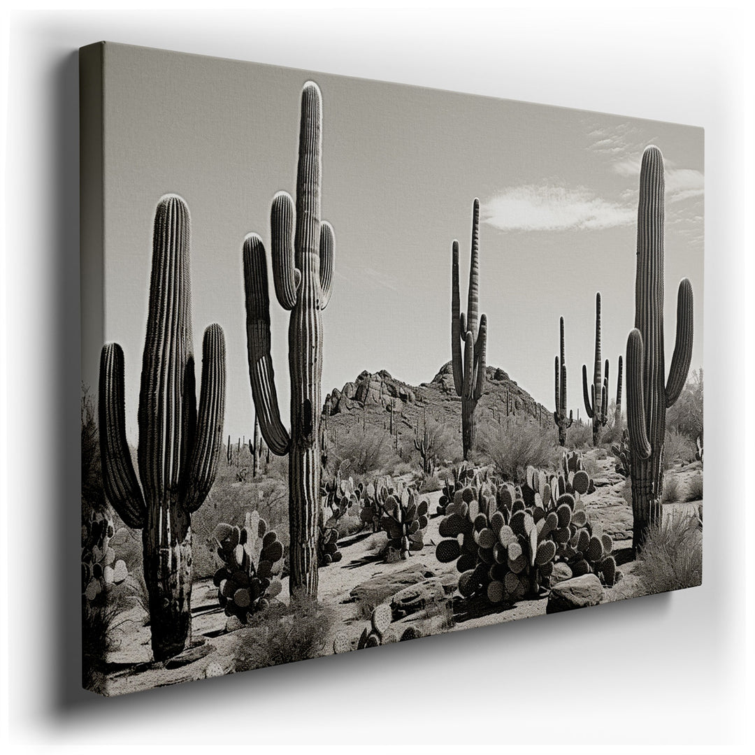canvas print on wrapped canvas for wall decor – This wall art is a breathtaking monochrome portrayal of the majestic saguaro cacti, standing tall amidst the tranquil ex...