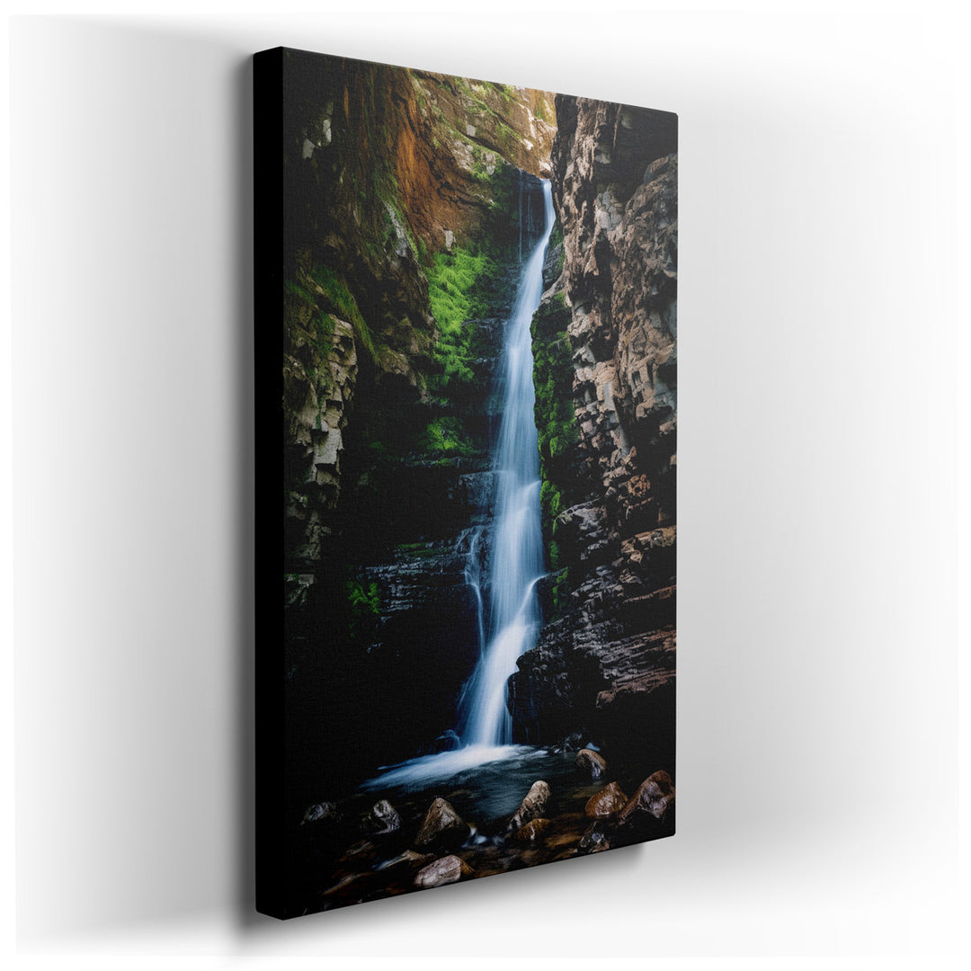 canvas print on wrapped canvas for wall decor – This wall art, a masterful depiction of a breathtaking waterfall cascading through rugged rock formations, is an exquisi...