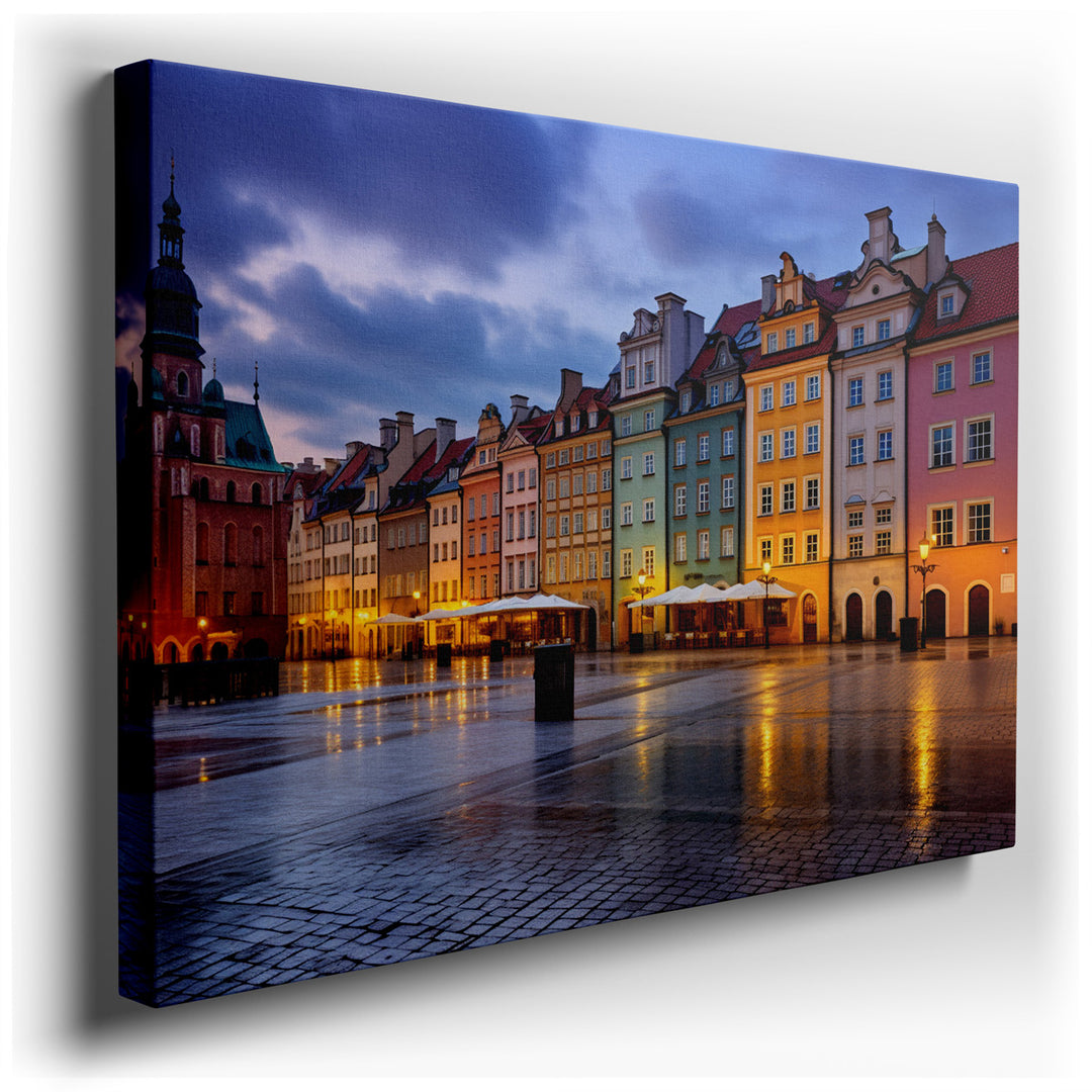 canvas print on wrapped canvas for wall decor – The wall art captures a breathtaking scene of a vibrant old town square during a beautiful evening. The setting is an en...