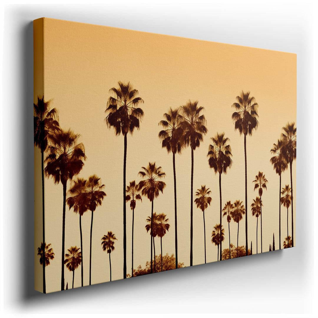 canvas print on wrapped canvas for wall decor – This wall art, a captivating portrayal of elegance and tranquility, features the silhouette of palm trees set against a...