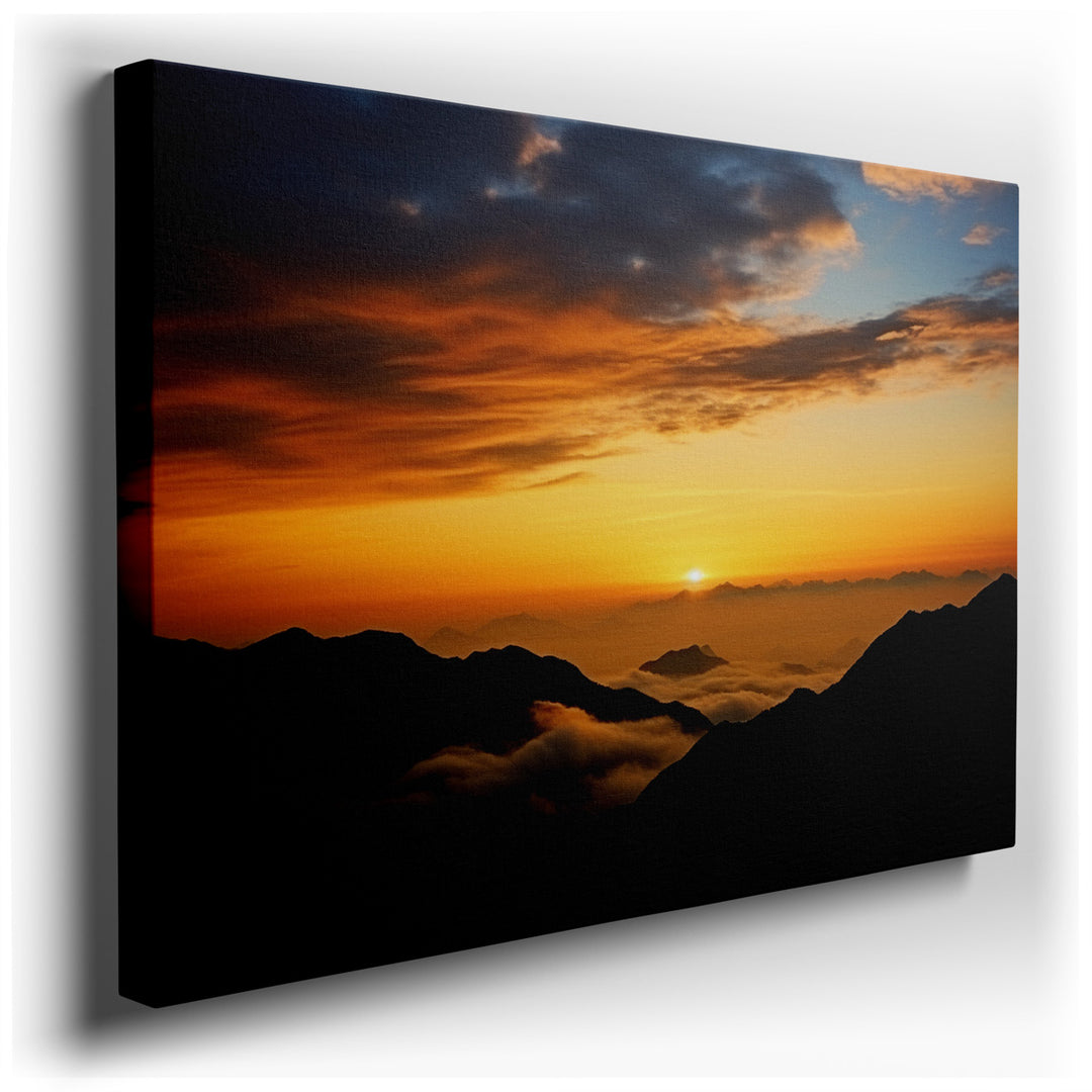 canvas print on wrapped canvas for wall decor – The wall art depicts a serene and breathtaking landscape, where the early morning sun gently rises above the mist-enshro...
