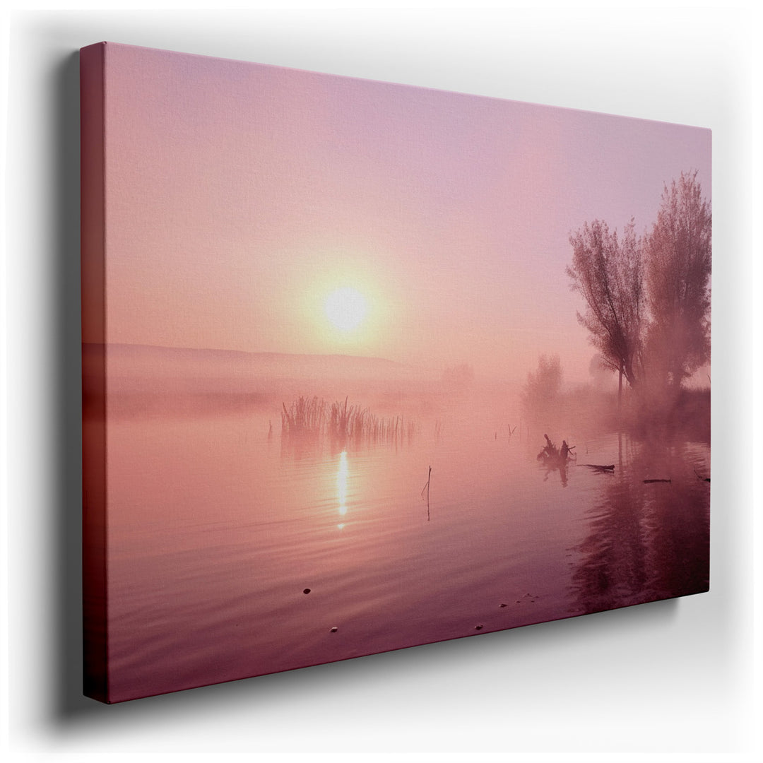 canvas print on wrapped canvas for wall decor – This exquisite wall art captures a serene view at sunrise, where soft pink hues gently illuminate a misty lake, creating...
