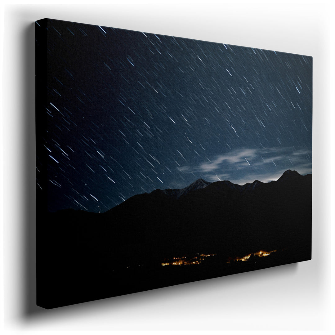canvas print on wrapped canvas for wall decor – This captivating wall art, a masterful representation of star trails over a rugged mountainous landscape, is a testament...
