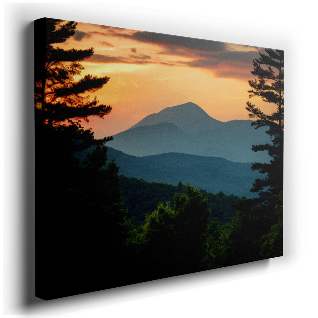 canvas print on wrapped canvas for wall decor – This exquisite wall art presents a serene depiction of a mountain range at the magical hour of sunset, where the sky mee...