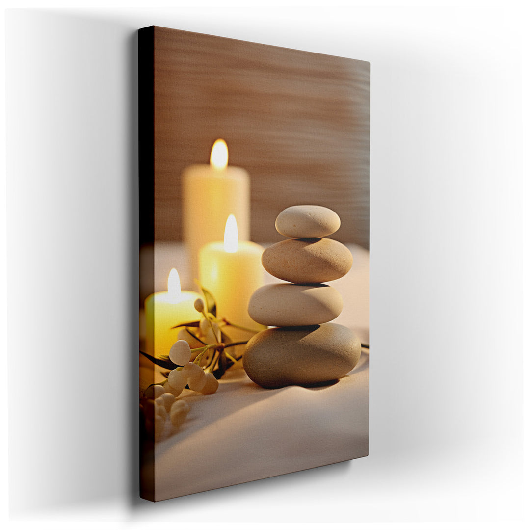 canvas print on wrapped canvas for wall decor – This exquisite wall art captures the serene beauty of a neatly arranged stack of stones, bathed in the gentle glow of ca...