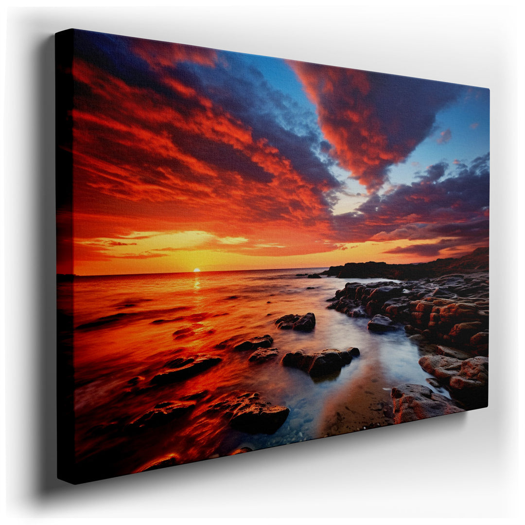 canvas print on wrapped canvas for wall decor – This exquisite wall art portrays a mesmerizing sunset cascading over a rugged shoreline, where the interplay of light an...