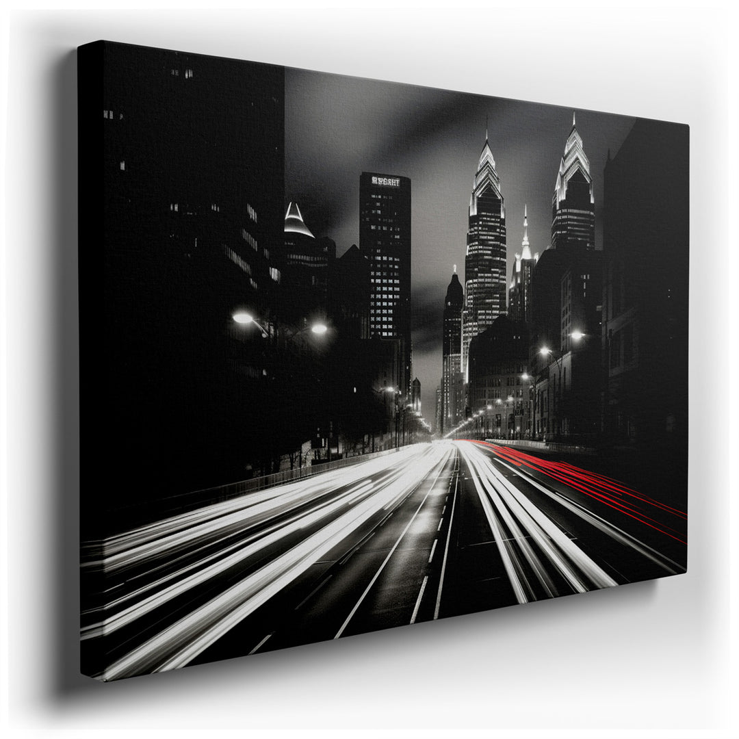 canvas print on wrapped canvas for wall decor – This wall art is a captivating representation of urban dynamism, rendered in a stark black and white palette that emphas...